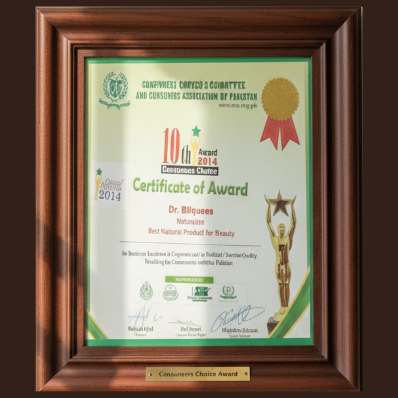 Framed certificate of award with green and gold design on a brown  backgroundFramed certificate of award with logos and text on a dark background by dr bilquis